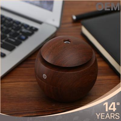 China USB Round Shape Essential Oil Ultrasonic Cool Humidifier Color Air Vapor Aroma Diffuser Fantasy Anion Wood Humidifier for sale