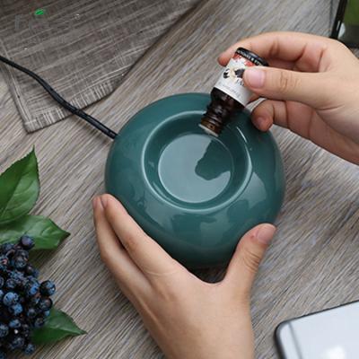 China FEA-X09 Wholesale Power Savings Package Gift Aroma Oil Burner Ceramic Fragrance Eco-friendly And Power Saving Set for sale