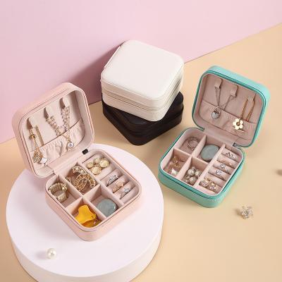 China SUNDO Hot Selling PU Leather Jewelry Storage Case Ear Stud Storage Box Portable Leather Travel Jewelry Organizer for sale