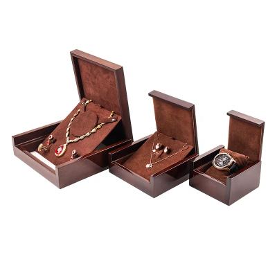 China Real wood + velvet; factory free packaging sample design 3d jewelry SUNDO display box for necklace earring ring custom logo wood jewelry boxes for sale