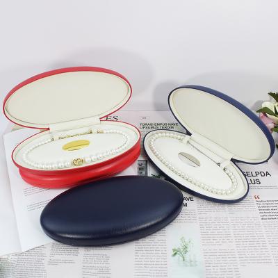 China SUNDO New Fashion Popular Design Leather Oval Pearl Necklace PU Leather Portable Jewelry Boxes In Stock for sale