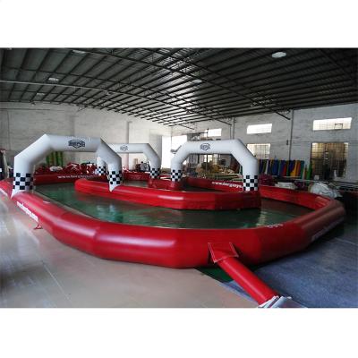 China PVC Customized Outdoor Sport Games Inflatable Race Car Track for sale