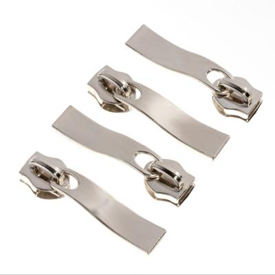 China Handbag Accessories Like Designs Auto Lock Garment Metal Zipper Puller Custom Cheap Tag Slider for sale