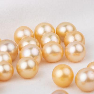 China 11-12mm freshwater cultured loose pearl high quality seawater pearl gold southsea pearl round shape for sale