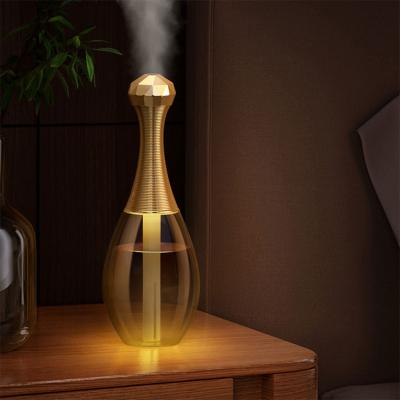 China USB Water Bottle Humidifier Home Office Home Car Air Sync Colorful Led Ultrasonic Humidifier for sale