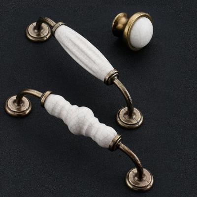 China EUROPEAN Vintage Ceramic Furniture Drawer Pulls, 96/128 Zinc Alloy Brass, Orchid Marble, Single Hole Porcelain Sideboard Handles for sale