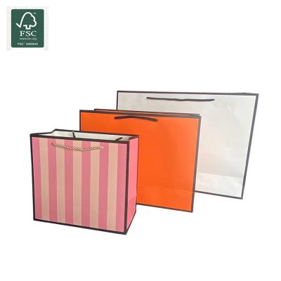 China Handmade Hot Sale Customized Multi Color Size Reusable Luxury Shopping Paper Gift Shopping Bags With Logos for sale