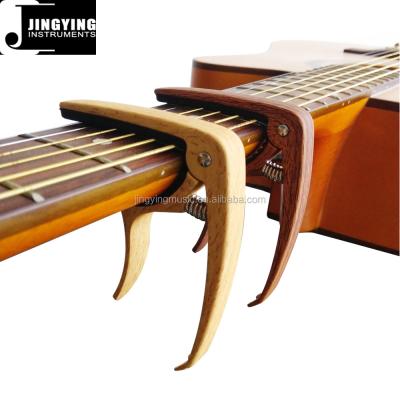 China Wholesale GUITAR Wood Grain Color Acoustic Guitar Zinc Alloy Capo for sale