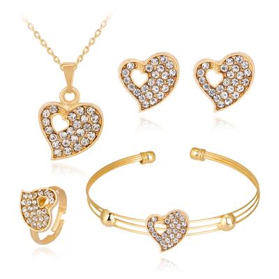 中国 New Wish Ethnic Hot Sale Alloy Diamond Gold Plated Heart Necklace Earrings 4pcs Jewelry Set 販売のため