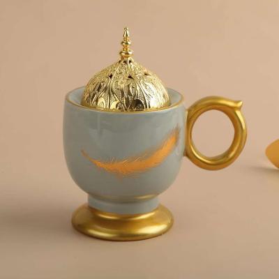 China 2020 New Arabia Hot Sale Design Resin Censer Cup Shape Creative Arabic Censer With Handle for sale