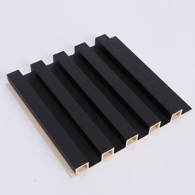 China Waterproof+ECO-Friendly Decor Black Wood Interior Veneered Wall Wpc Board Slat Grooved Plastic Composite Wall Panel for sale