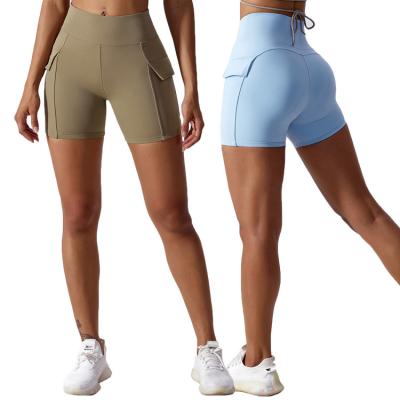 China Breathable Pantalones Cortos Deporte Side Pockets Smooth Stretch Yoga Fitness Biker Shorts High Waist Women Gym Shorts for sale