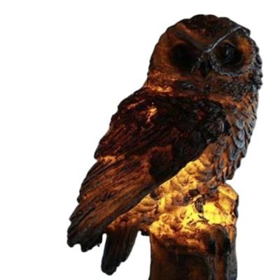 China Solar Led Animal Induction Garden Landscape Lawn Lamp Owl Wind Bell Lamp Pendant Residential Modern Resin Decoration Yard for sale