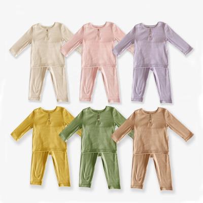 China 2022 Winter Fall New Designer Girls Cotton Custom Kids Sleepwear Infant Soft Solid 100% Thermal Infant Little Girl Pajamas Set Rib Pajamas for sale