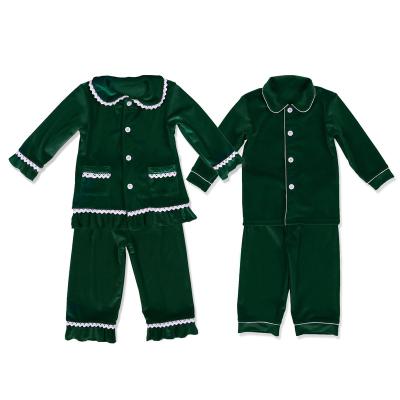 China 2021 QUICK DRY christmas moq stock RTS kids sleepwear set stockings matching empty green christmas pajamas velor kids boys girls pajamas for sale