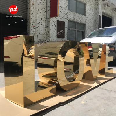 China Indoor or outdoor party mirror gold metal table letters for wedding supplies, wedding love letter cake table for wedding decoration for sale