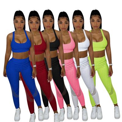 China Breathable Wholesale Ladies Gym Workout Clothing Set Women 2 Piece Bra And Pants Set for sale