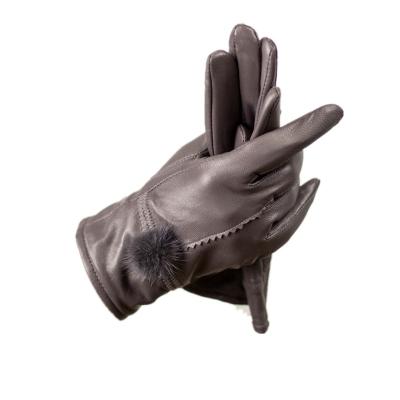 China Wholesale Sheepskin Mink Fur Ball Leather Gloves Women Plus Velvet Thickened Sheepskin Gloves for sale