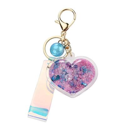 China Couples Plastic Creative Acrylic Bag Car Heart Peach Glitter Key Chain Love Quicksand Oil Bottle Pendant Acrylic Key Chain for sale