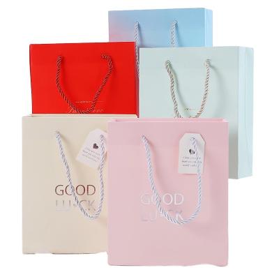 China Customized Recyclable Custom Printed Aesthetic Logo Fashion Gift Kraft Paper Single Bag for sale