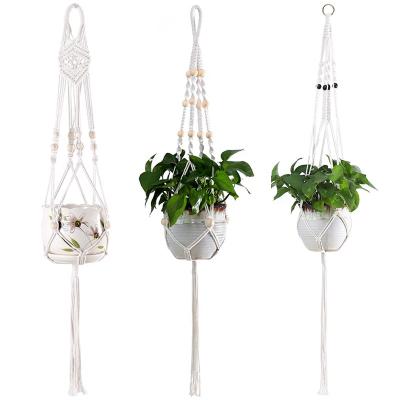 China Amazon Handmade Home Decor Woven Cotton Rope Eco-Friendly Hot Selling Macrame Hanging Macrame Plant Indoor Outdoor Hangers For Home Decor for sale