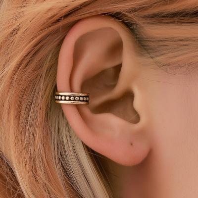 China Fast Delivery Fashion Hollow Wave Earrings Slap Clip For Girls Ear Clips Non Patching Earrings For Women Men for sale