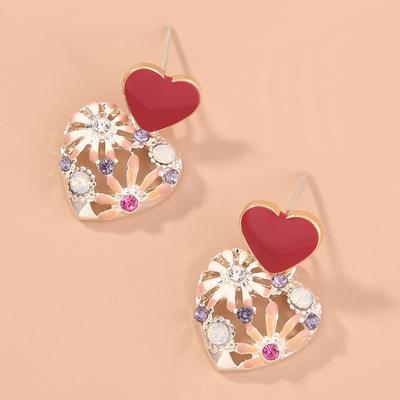 China TRENDY Hollow Flower Dangle Earrings Gifts Retro Style Plated Heart Drop Earrings for sale