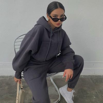 China 2021 Drop New Arrival Custom Logo Hoodie Women Long Sleeve Gym Breathable Two Piece Crop Top Pullover Set With Joggers for sale