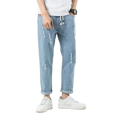 China Hot Selling Viable Plus Size Skinny High Street Patched Leopard Denim Jeans Skinny Pants Men's Tapered Jeans for sale