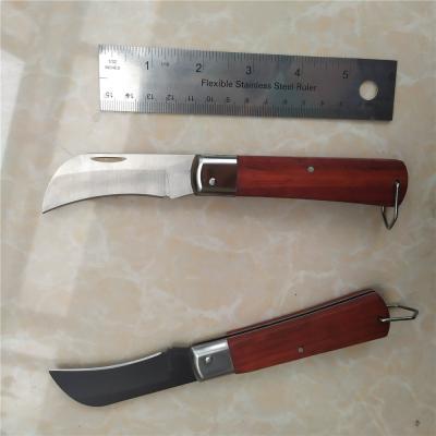 China Non-variable Cable Head Angled Skinning Knifec Cutting Hook Cutting Interesting Folding Pocket Knife With Wooden Handle for sale