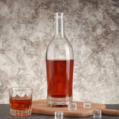 China Whiskey Thick-Based Empty Glass Ice Bottle 700ml Wine Bottle Rolling Bottle for sale