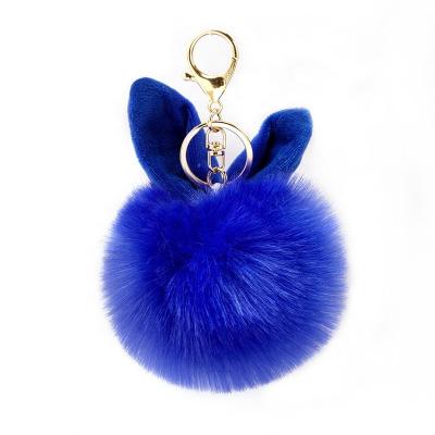 China Fluffy and Smooth Hot Sale Wholesale Cat Ear Shape Soft Faux Rabbit Fur Pompom Key Chain Purse Fur Pompom for sale