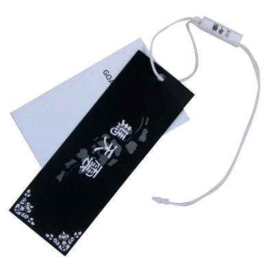 China Customized White And Black Clothing Hang Tag With Swing Drops For Garments for sale