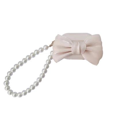 China Fashiontable Ins Silk Bow for Airpods 1/2 generation cover device pro3 earphone shell pearl chain soft female for sale