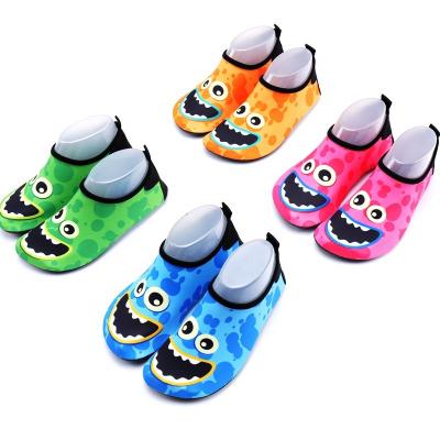 China Flat Children's Beach Shoes Casual Slip-On Anti-Slippery TPR Material Socks Flat Sandals Slides TPR Unisex Slippers for sale