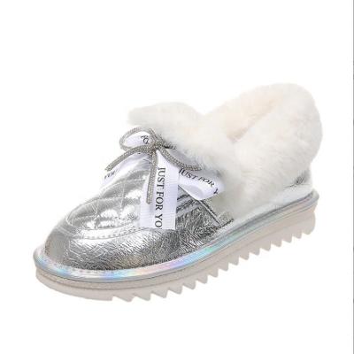 China New Wholesale New Round Plush Outdoor Thick Sole Flat Snow Boots Cotton Bowknot Women Hairy Slip On Shoes for sale