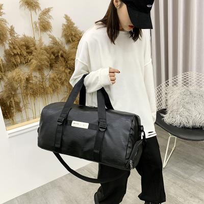 China Fashion custom luxury large capacity black leather duffel bags logo sublimation women travel pu duffel bag for men for sale