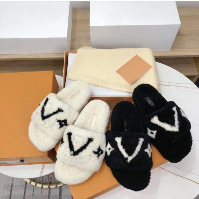 China New autumn and winter durable lambswool slippers with large letters and foot pedal wool shoes women's slippers for sale