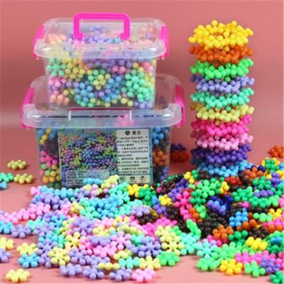 China 2021 Creative Set Variety Snowflake Building Blocks Material Plastic 3D Products DIY Children's Puzzle Toy Baby Gift Eco-Friendly for sale