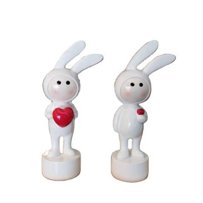 China Central Statistical Wholesale Wind Crafts Africa Resin Creative Cartoon Couples Debur Rabbit Decoration New Year's Day Gift Home for sale