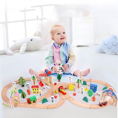 China Wooden Slot Toy 78pcs Tracks Train Magic Railway Set Puzzle Train Track Toys Electric Toy Trains For Children for sale