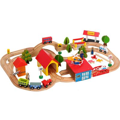 China Slot Toy 69 Pieces Creative Set Of Toy Diy Track Engineering Rail Train Wooden Toys Robot Train for sale