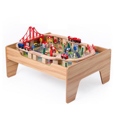 China Wholesale 100pcs Big Track Toy Slot Toy Set Christmas Wooden Train With Table Wooden Toy Train for sale