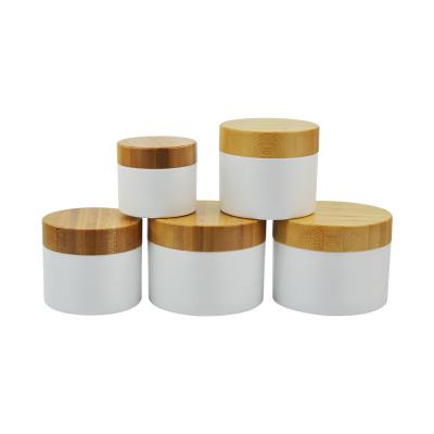 China 30g 50g 100g 200g 250g Eco-friendly Cosmetic Bamboo Jar Plastic White Empty Cosmetics Bottles/Jars/Containers For Skin Care for sale