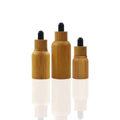 China Personal Care All Bamboo Wooden Packaging Lotion Bottle 50ml Essential Oil Cosmetic Dropper Bottle for sale