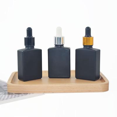 China Cosmetic Black Amber Blue Green Square White Essential Oil Dropper Bottle Rectangle 1oz 30ml PUMP Sprayer Glass Screen Printing Clear KX for sale