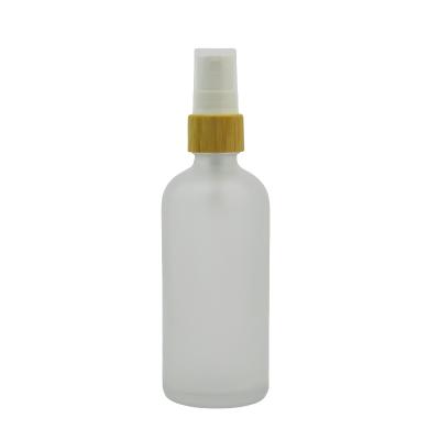 China Cosmetic Frosted Clear Glass Spray Bottle With Bamboo Cap 5ml 10ml 15ml 20ml 30ml 50ml 100ml for sale