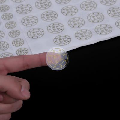 China Transparent vinyl custom logo printing sticker anti-scratch waterproof self adhesive label PVC stickers for sale