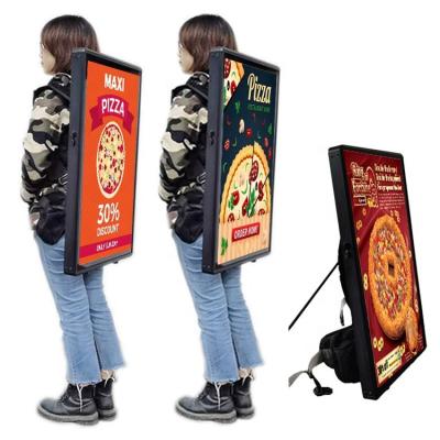 China New Design Backpack Game Videos USB Publicidad Machine USB Publicidad Machine Signage Battery Operated Walking Digital Advertising Player for sale