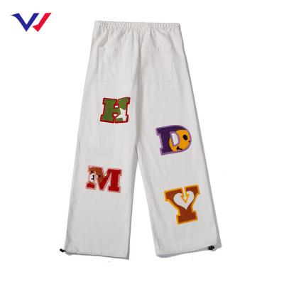 China Anti-wrinkle casual custom logo chenille embroidered print elastic waist drawstring fashion winter pants for sale